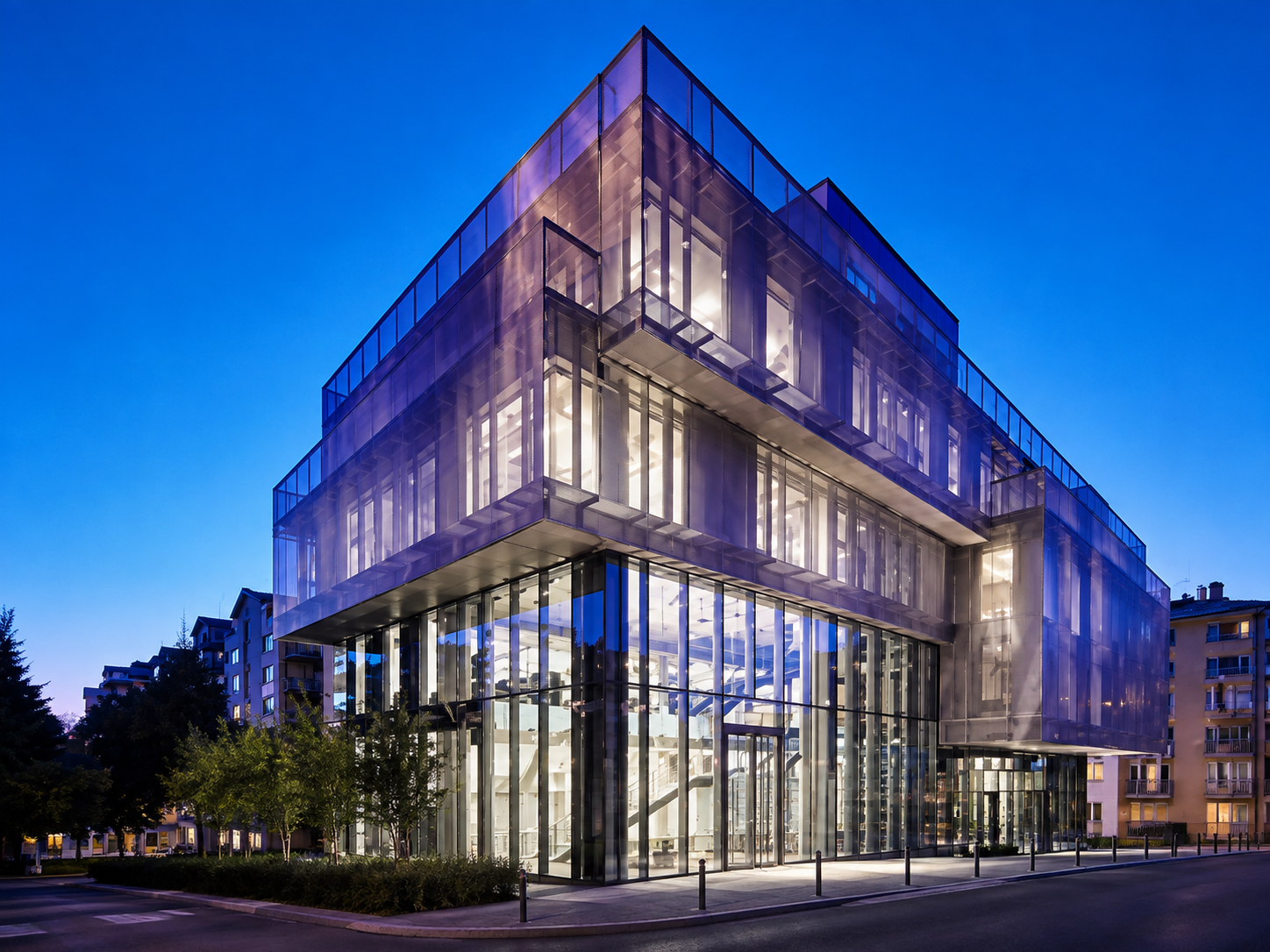 Modern corporate office building at dusk